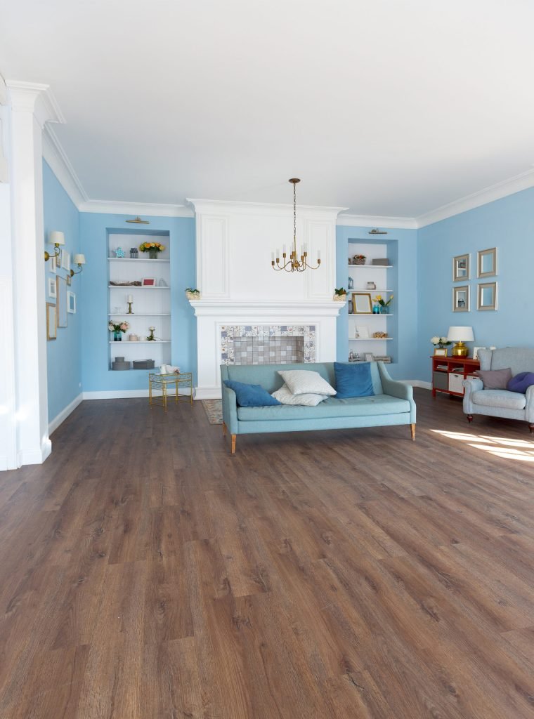 Nice cozy interior of a spacious room in gentle blue tones